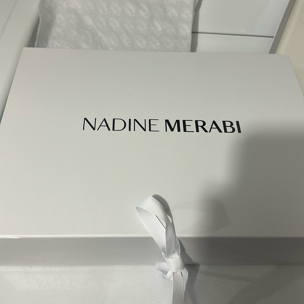 Nadine Merabi Jumpsuit, size Small. NEVER WORN